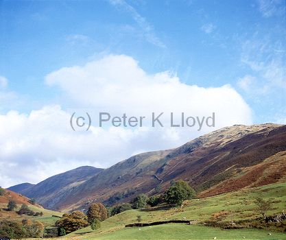 Meadow and range of high fells Troutbeck Lake District Cumbria